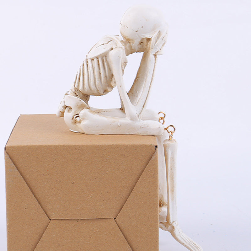 Paha luurankofiguuri goottilaiseen ja halloween-koristeisiin